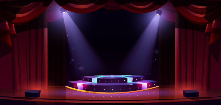 Image of a stage with spotlights shining on it